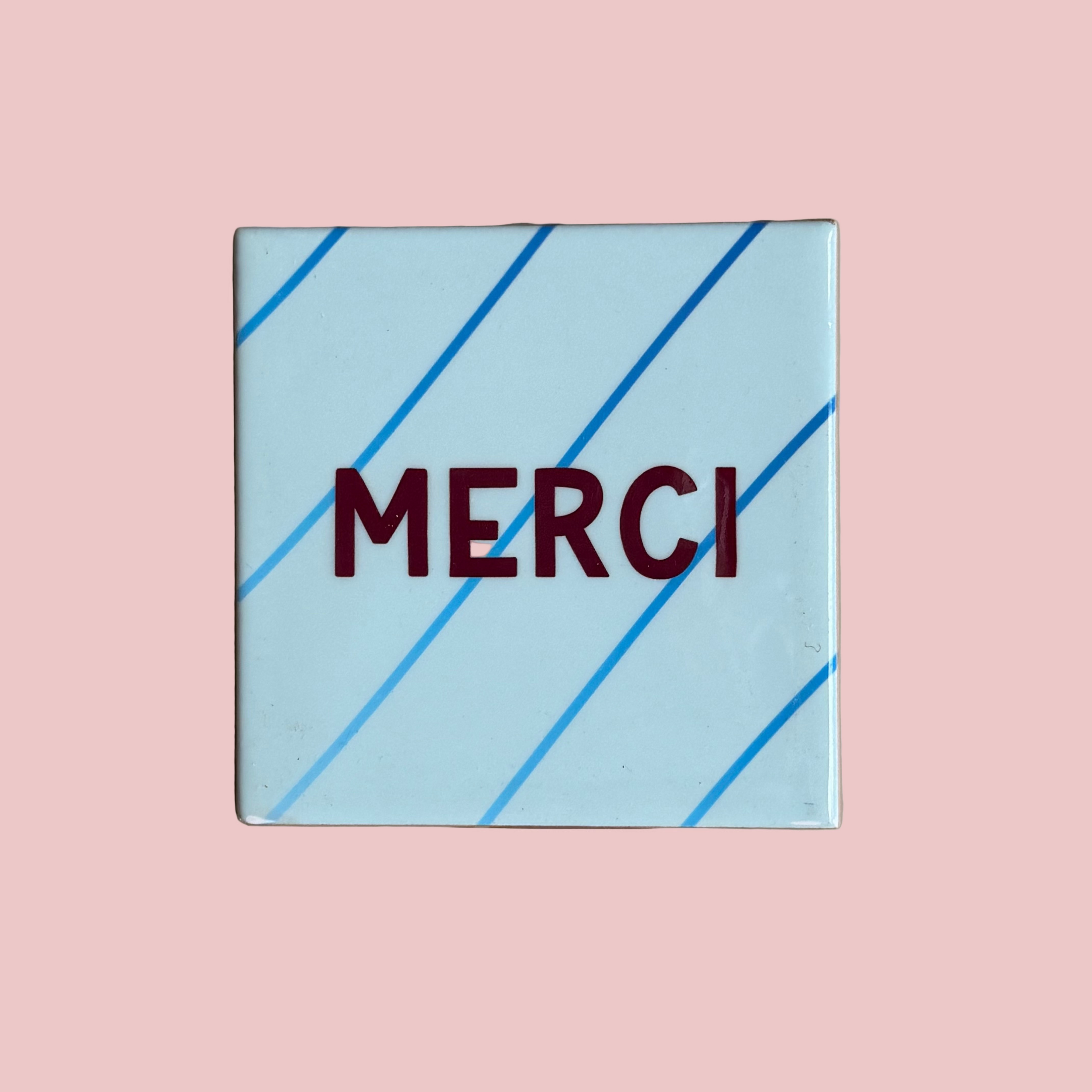 Tegeltje - Merci