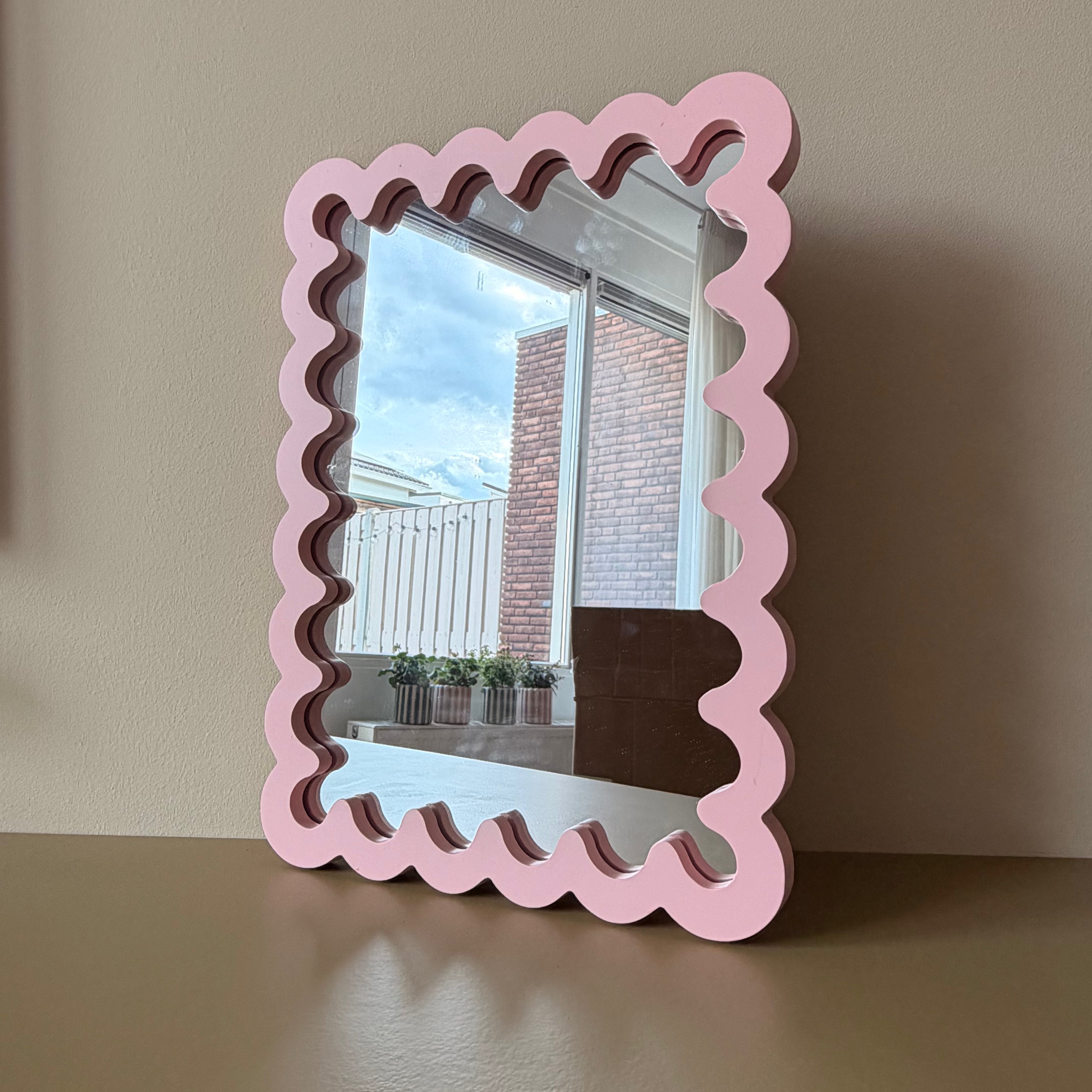 Spiegel wavey vierkant roze